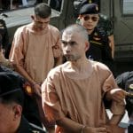 两名涉嫌在曼谷炸毁一座印度教寺庙的维吾尔人在泰国出庭受审