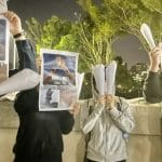 香港内地生国际人权日举白纸火炬 呼吁关注中国白纸示威被捕人士