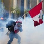 秘鲁新政府在抗议中给予军方新权力