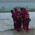 中国提高东北洪水级别 至少215人死亡或失踪