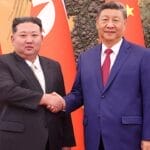 习近平在北京同金正恩会谈 韩媒指会面持续了约1小时