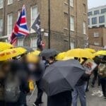 逾千在英港人游行纪念雨伞运动11周年 罗冠聪赴星出席活动遭扣查遣返